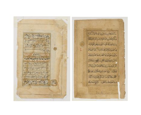 Group of two 19th century Persian Qur'an leaves, each decorated with beautiful gold accents and stunning calligraphy.Height: 