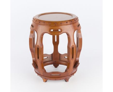 George Zee &amp; Co., Hong Kong. Carved wooden garden barrel shaped stool. With a label affixed to the underside.Height: 18 1
