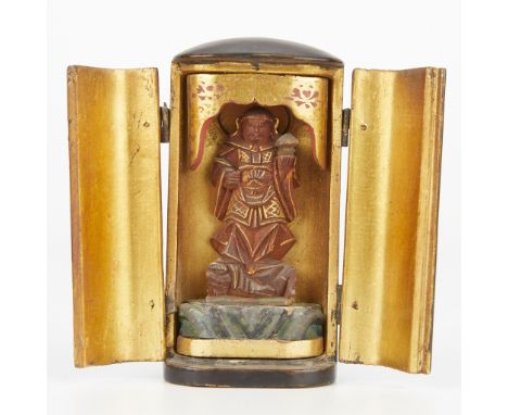 Small Japanese 19th century zushi shrine with black lacquer case, gilt interior, and a hand carved Buddhist figure within the