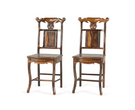Pair of Chinese wooden ebony chairs with flat panel seat, cabriole legs, and variegated wood stain. Back splat secured by two