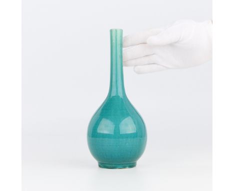 Chinese Guangxu period ceramic vase with a blue crackle glaze.Height: 9 1/2 in x diameter: 4 1/4 in.Condition: Crazing to the