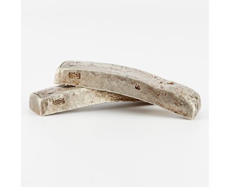 Pair of Vietnamese Minh Mang ten Lang (tael) silver sycee ingot bars, ca. early 19th century. Each marked along the sides.Eac