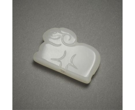 Chinese carved white jade bead in the form of a ram. With shallow incised lines depicting the ram with its legs tucked undern