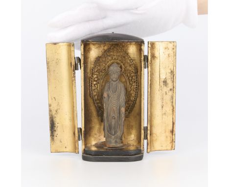 Wooden Japanese zushi shrine with hand-carved wooden figure, 19th century. With lacquered wood exterior and gilt along the in