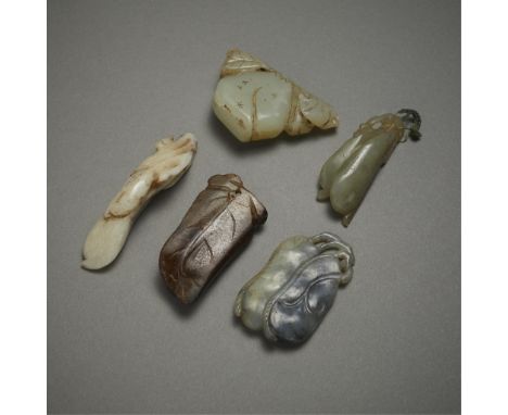 Group of five Chinese jade fruit carvings including:One opaque, delicately carved grey peach with skillfully incised details 