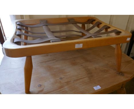 An Ercol Blonde beech footstool 