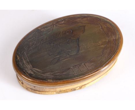 19th Century horn snuff box, of oval form, the lid initialled GJ and dated 1827, 8cm wide