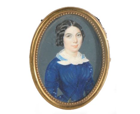 19th Century portrait miniature of a woman with black ringleted hair wearing a blue dress with silk collar, housed in an oval