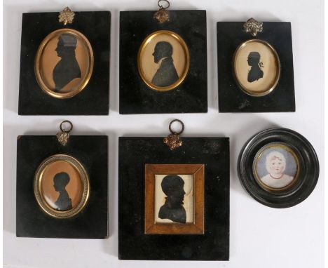 Five framed silhouettes and a framed portrait of a child, the largest 12.5cm wide, 14cm high (6)