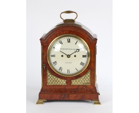 George III mahogany mantel clock, Dwerrihouse &amp; Carter, London, the arched caddy top with brass fittings above the gilt b