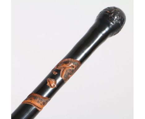 Japanese painted bamboo walking stick, the top with a burred design above a carved snake to the body, 90cm long&nbsp;