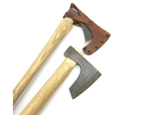 Swedish hunting axe the head marked Gransfors-Bruk, the ash handle with bun pommel and leather head cover, L45cm; and another