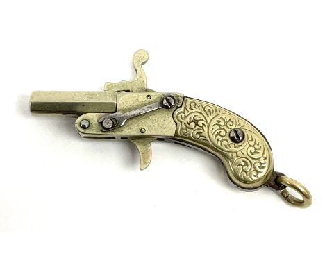 Miniature all nickel .22 pin fire single shot pistol with engraved grip and suspension ring to the butt L4.5cm