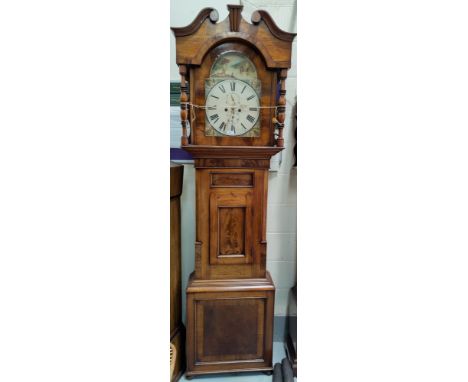 A large mid 19th Century figured mahogany long case clock with swan neck pediment and turned pillars to the hood. Short door 