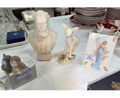 A 1930's Bisto rectangular plaque, young woman and gulls; a Nao group, kittens in a box; a 19th century parian bust, E K Neal