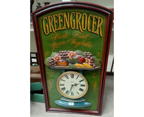 A retro 'Greengrocer' kitchen clock in painted wood surround, 83 x 45cm 