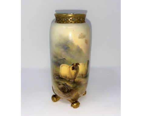 A Royal Worcester cylindrical vase with pierced gilded rim and 4 scroll feet, hand painted with sheep in a landscape, signed 