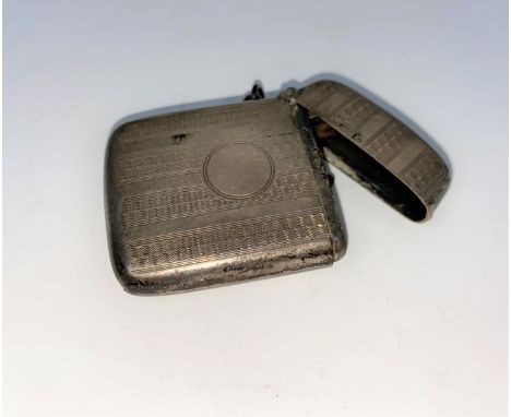 An engine turned Vesta case, Birmingham 1925 and a rectangular continental patch box with hinged lid, stamped 925 