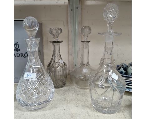 A cut glass decanter and other glassware 