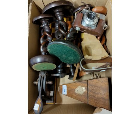A mahogany cased metronome; a Voigtlander 35 mm camera; 8 various barley twist candlesticks 