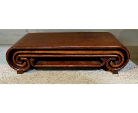 A Chinese wooden nest of item stands&nbsp;20 x 8 x 4cm