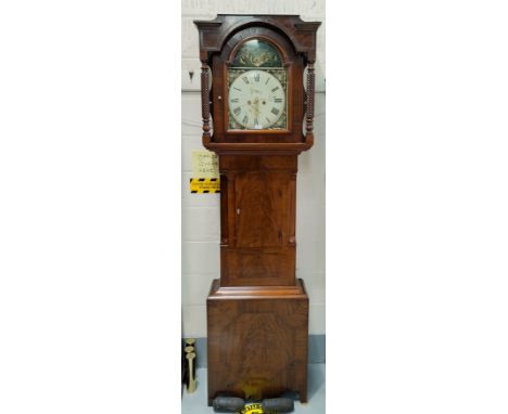 A mid 19th Century long case clock, the hood with rope twist coloumns, trunk with short door, having painted arch dial with 8