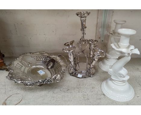 A 5 branch silver plated epergne; a silver plated fruit bowl and a pair of 'Leedsware' china dolphin candlesticks 