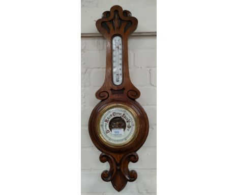 An early 20th century carved aneroid barometer with thermometer,  length 65cm3 Oriental carved hardwood figures of sages and 