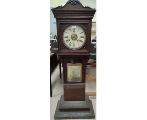 An International Time Recording Co London clock made in the USA, in unusual carved wooden case height 140cm 