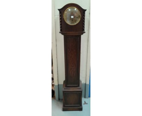 A 1930's oak grandmother clock with chime 