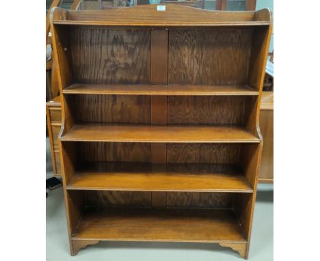 An early 20th century stained ash 4 height church bookcase with hinged top shelf, PAT. APL, 92cm 