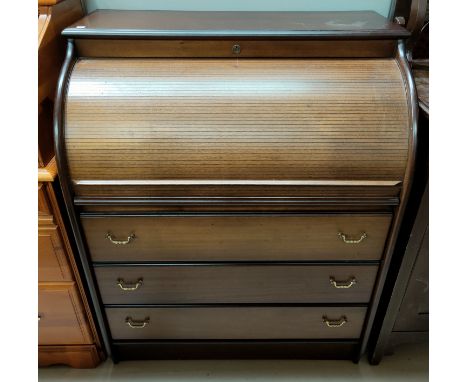 A mahogany reproduction roll top bureau three long drawers bellow 