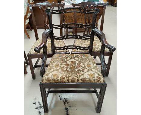 A mahogany Chippendale style armchair; 2 dining chairs 