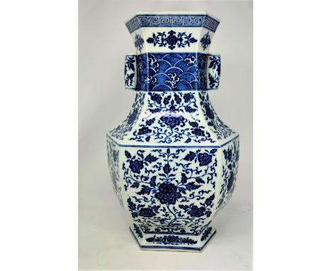 A large 18th/19th century hexagonal balluster Chinese vase with waisted neck and twin open cylindrical handles to the neck, w