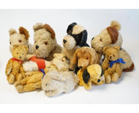 Four Merrythought dogs and three others, c.1950's, together with three cotton plush bears and one rabbit (11). Condition - fa