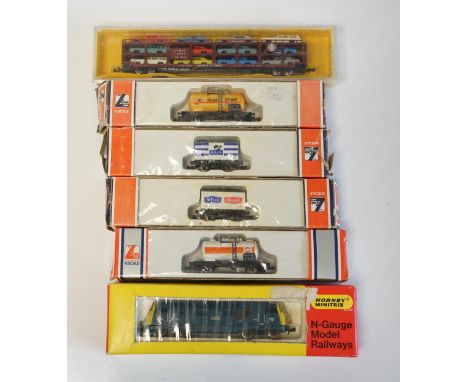 A quantity of N boxed gauge model railway by Graham Farish, Lima, Peco, etc., including five diesel locomotives, four in BR l