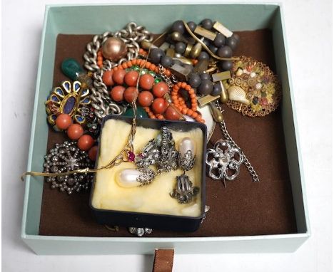 A collection of costume jewellery to include a gold bar brooch and a ruby and diamond pendant. Condition - a.f.