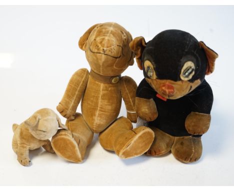 A Chad Valley Ooloo the cat, with label and button, c.1920's, 29cm high, good condition but grubby, A Chad Valley Bonzo the d