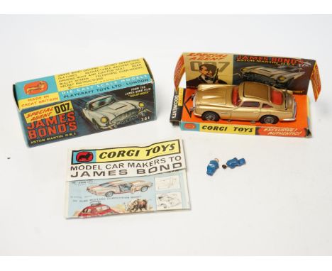 A boxed Corgi Toys James Bond 007 Aston Martin (261), a first issue example in gold finish, boxed with inner display stand, e