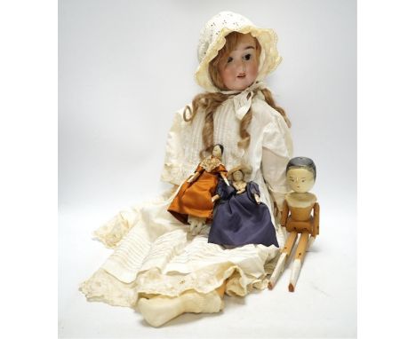 A Max Handwerck doll, jointed body, vintage clothes, 60cm high, one finger broken, together with a collection of eleven peg w