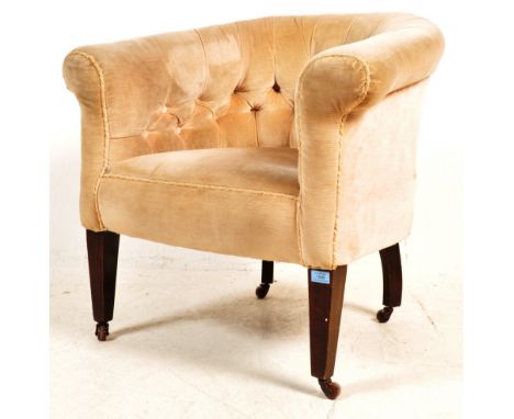 A late 20th century Victorian Revival tub chair having a chesterfield style button back rest upholstered in a white colourway