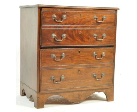 A 19th century George III mahogany bachelors commode chest of drawers. Small proportions having having twin drawers with swin