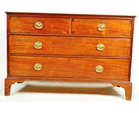 A 19th century George III mahogany chest of drawers having a flared top over a bank of two over two drawers raised on bracket