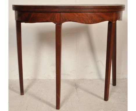 A late 18th century George III mahogany D end / demi lune card table in the manner of Sheraton. The card table having a inlai