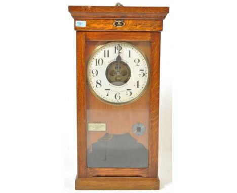 A vintage retro circa 1940’s Blackfriars National Time Recorder. The time recorder machine having a white dial with Arabic nu