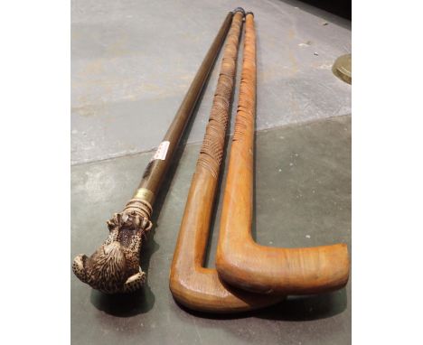 Three walking sticks, one with eagle handle. P&amp;P Group 2 (£18+VAT for the first lot and £3+VAT for subsequent lots) 