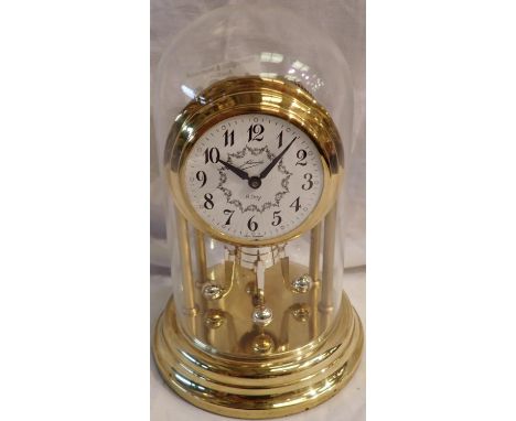 Schmid 8 day anniversary dome clock, with pendulum, H: 16 cm, working at lotting. P&amp;P Group 2 (£18+VAT for the first lot 