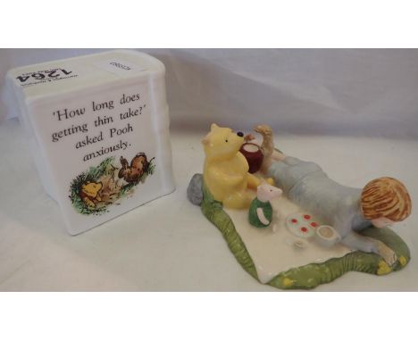 Two Winnie The Pooh ceramics, largest H: 10 cm. P&amp;P Group 2 (£18+VAT for the first lot and £3+VAT for subsequent lots) 