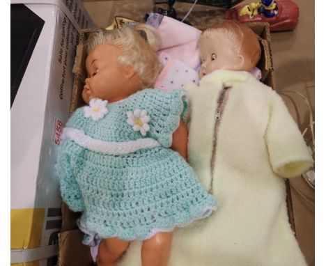 Hard plastic doll by B.N.D London, H: 33 cm, and a further doll, H: 40 cm, including clothing. P&amp;P Group 1 (£14+VAT for t