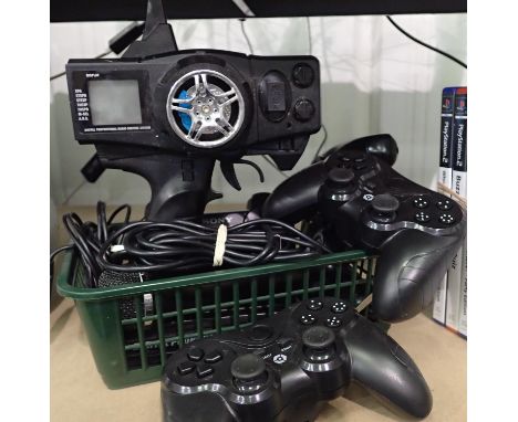 Mixed console controllers including a digital proportional system. P&amp;P Group 2 (£18+VAT for the first lot and £3+VAT for 